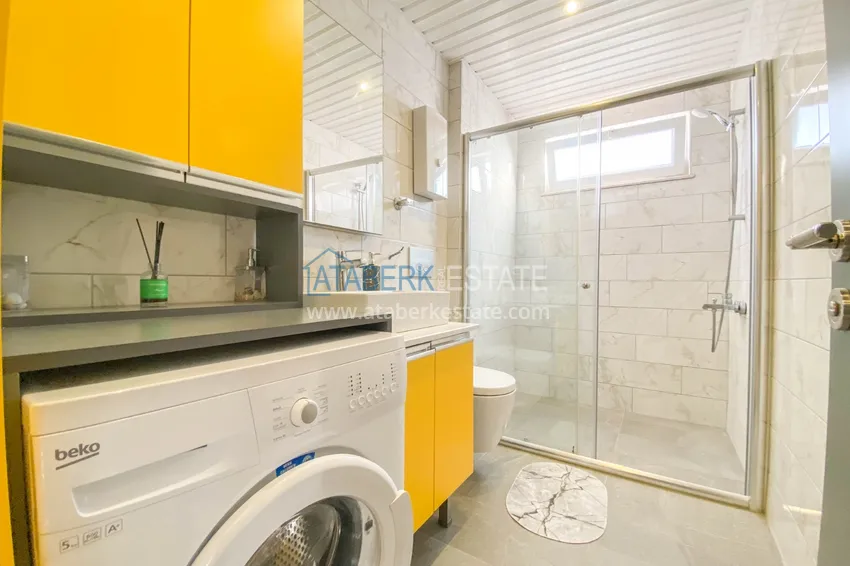 Приобрести Квартира в Махмутларе с новой мебелью и застекленным балконом в комплексе комфорт-класса 16 