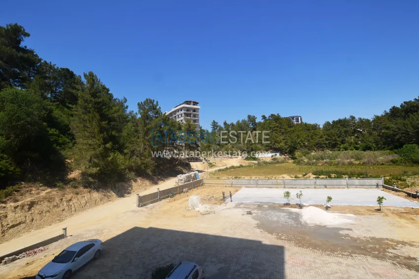 Приобрести Квартира в районе Авсаллар в новом современном комплексе на завершающем этапе строительства 18 