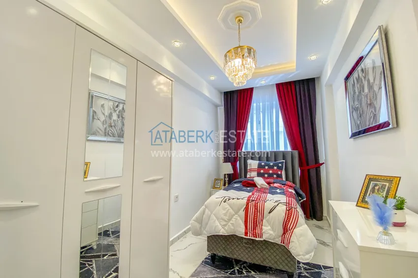 Приобрести Квартира в Махмутларе с мебелью и отдельной кухней, в жилом комплексе с бассейном 17 