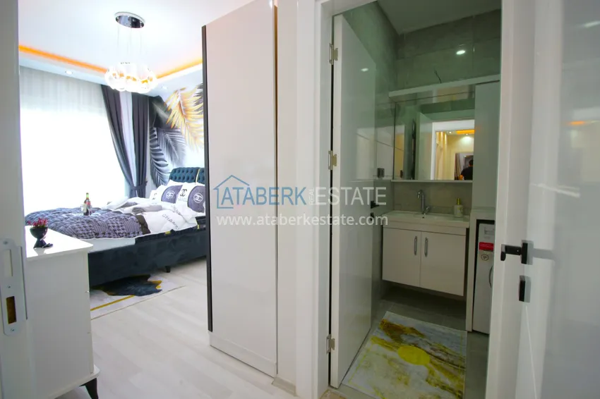 Приобрести Квартира в Махмутларе с новой мебелью в современном новом комплексе 18 