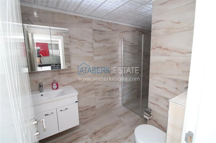 Приобрести Пентхаус в Махмутларе с мебелью, сауной и видом на море и горы 19