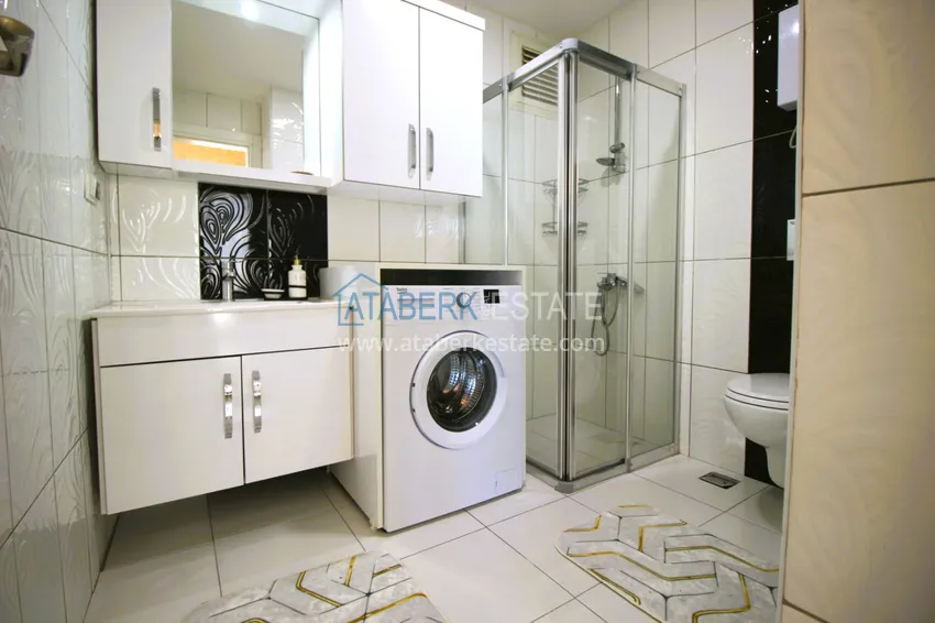 Приобрести Квартира в Махмутларе меблированная с видом на море с наилучшим месторасположением 19 