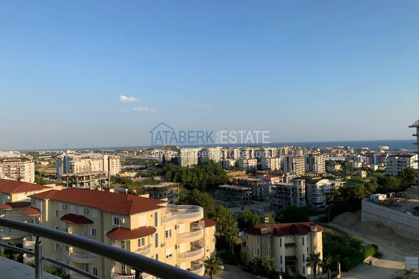 Приобрести Двухуровневые пентхаусы в Алании район Авсаллар с видом на море и горы 19 