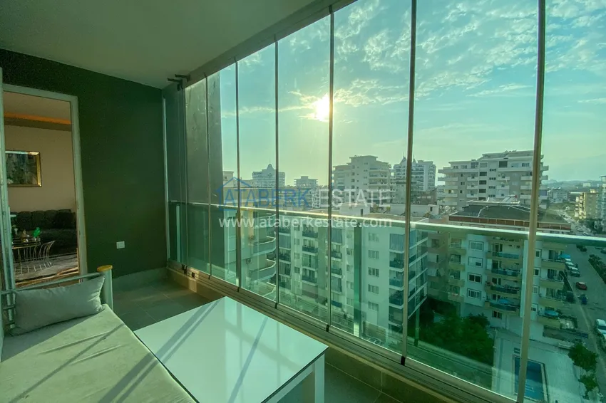 Приобрести Квартира в Махмутларе с новой мебелью и застекленным балконом в комплексе комфорт-класса 17 