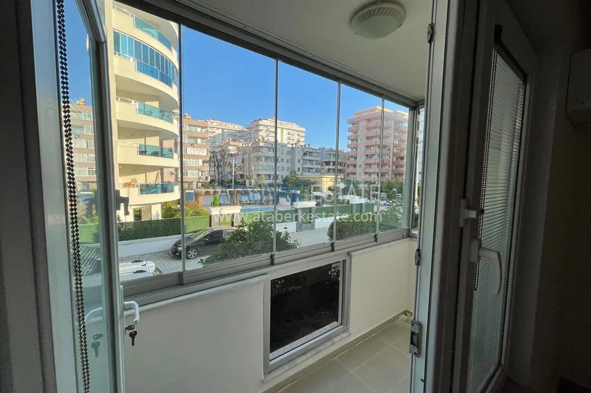 Приобрести Квартира в Махмутлар с двумя спальнями и застекленными балконами в комплексе на первой береговой 22 