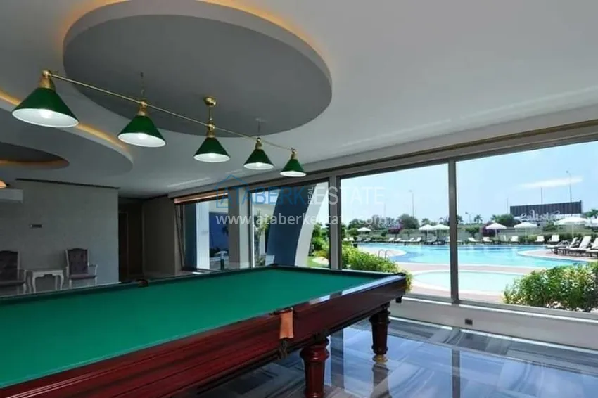 Квартира в Махмутларе с мебелью в комплексе премиум класса, на первой линии 23