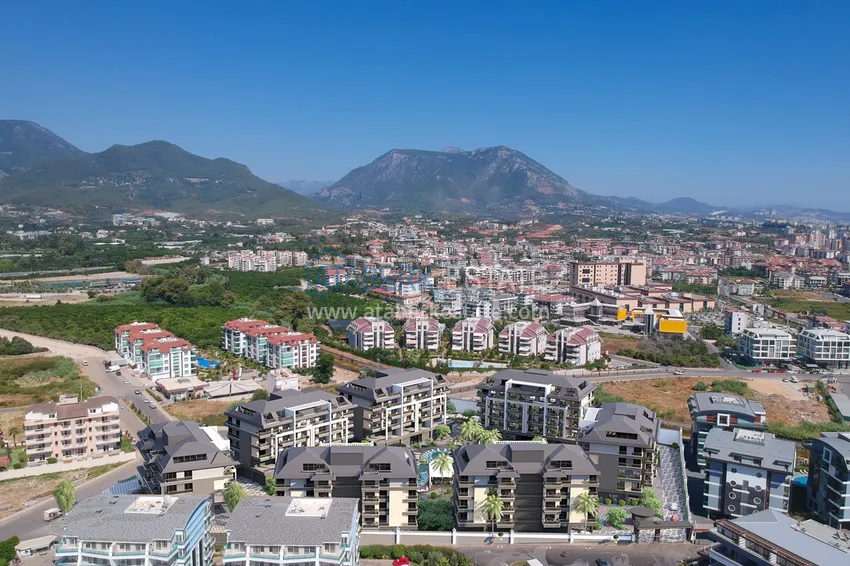 Квартира в районе Оба в жилом комплексе на этапе строительства 5 