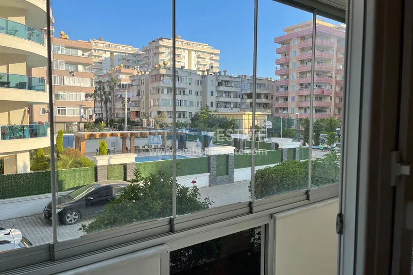 Приобрести Квартира в Махмутлар с двумя спальнями и застекленными балконами в комплексе на первой береговой 23 