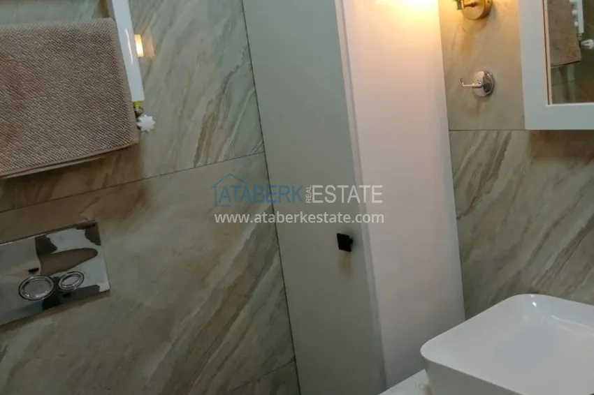 Приобрести Квартира с выходом в сад в Анталии - район Хурма, меблированная с видом на горы 18 