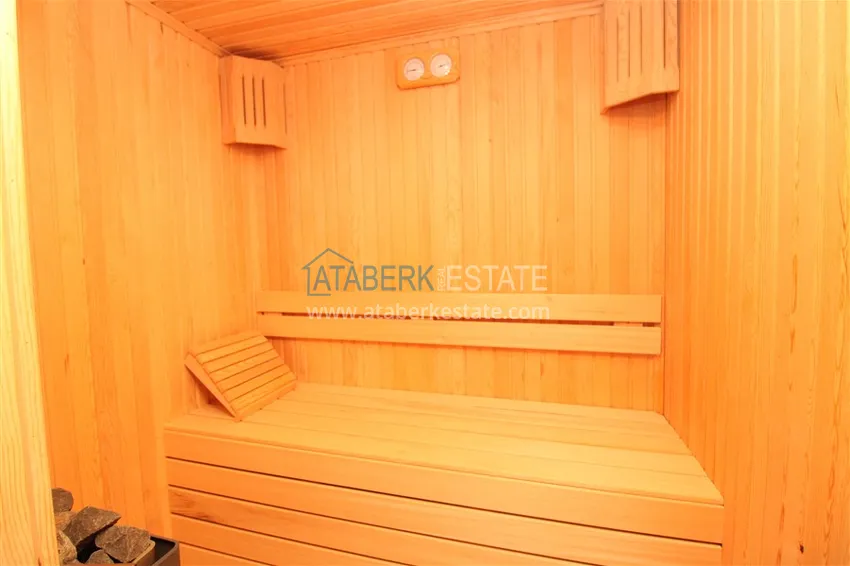 Приобрести Пентхаус в Махмутларе с мебелью, сауной и видом на море и горы 21