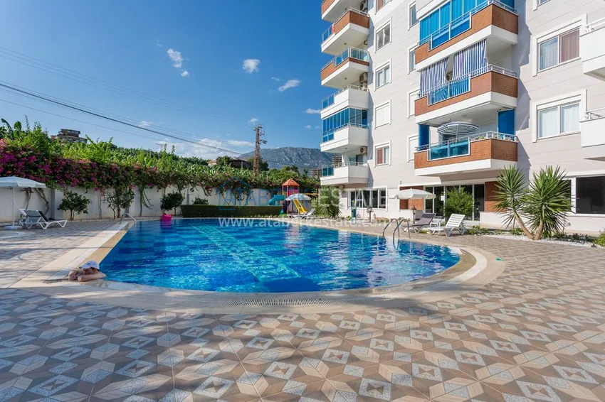 Квартира в Махмутларе в благоустроенном жилом комплексе полностью готовая для проживанияи с мебелью с видом на море и горы 1 