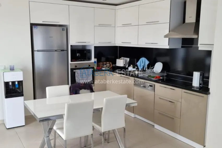 Приобрести Квартира в Махмутларе в благоустроенном жилом комплексе полностью готовая для проживанияи с мебелью с видом на море и горы 1 