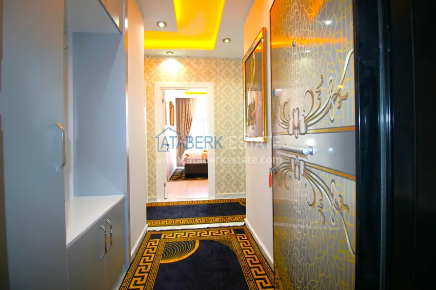 Приобрести Квартира в Махмутларе с новой мебелью в современном новом комплексе 1 