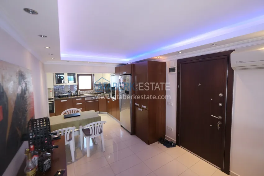 Приобрести Квартира в Махмутларе трехкомнатная с мебелью на 1 береговой линии 1 