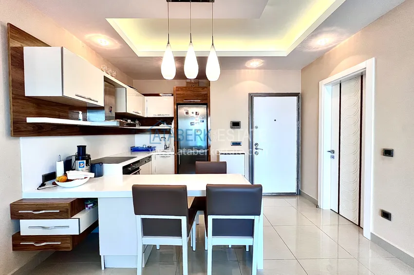 Приобрести Квартира в Махмутларе с мебелью в комплексе премиум класса, на первой линии 1