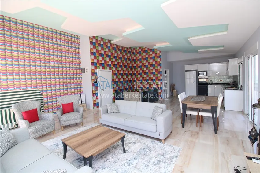 Приобрести Пентхаус в Махмутларе с мебелью, сауной и видом на море и горы 1