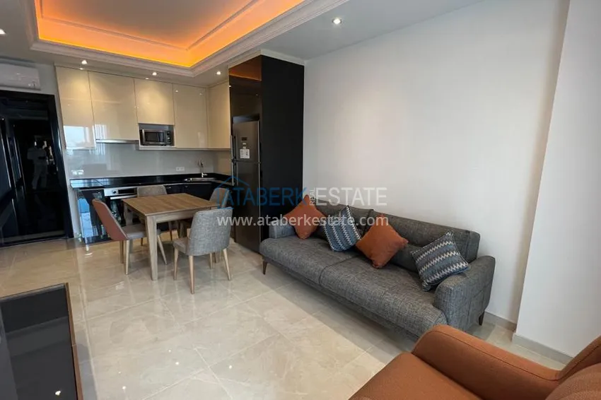 Приобрести Квартира в Махмутларе с чистовой отделкой, новой мебелью и видом на море 2