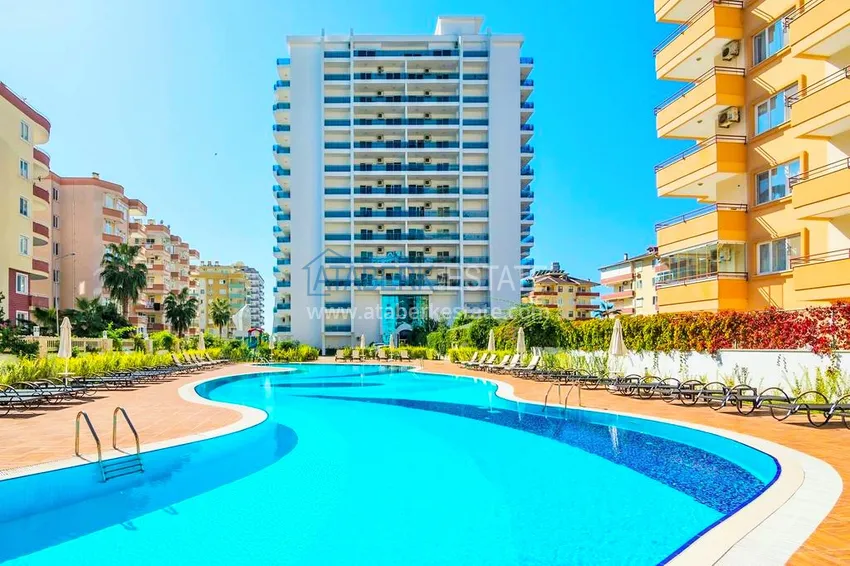 Квартира в Махмутларе меблированная с застекленным балконом и открытым видом на море 1 