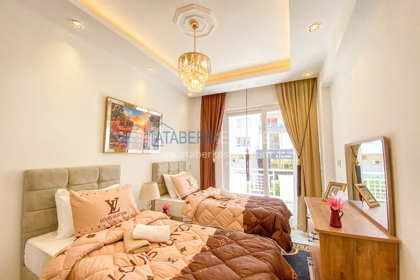 Приобрести Квартира в Махмутларе с мебелью и отдельной кухней, в жилом комплексе с бассейном 21 