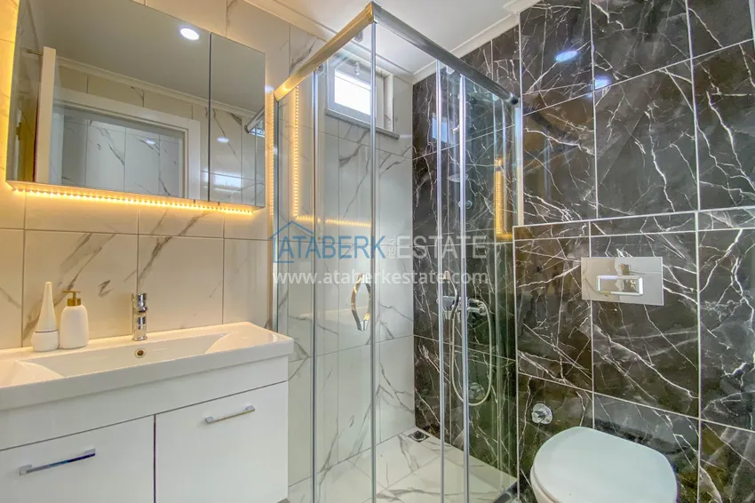 Приобрести Квартира в районе Демирташ со стильным интерьером в новостройке 23 