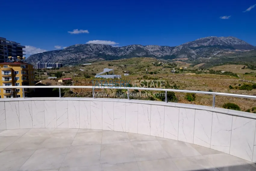 Приобрести Пентхаус-дуплекс в Махмутларе с мебелью и видом на море и горы 23 