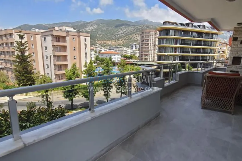 Приобрести Квартира в центре Алании - район пляжа Клеопатра, с современной мебелью и видом на горы  25 