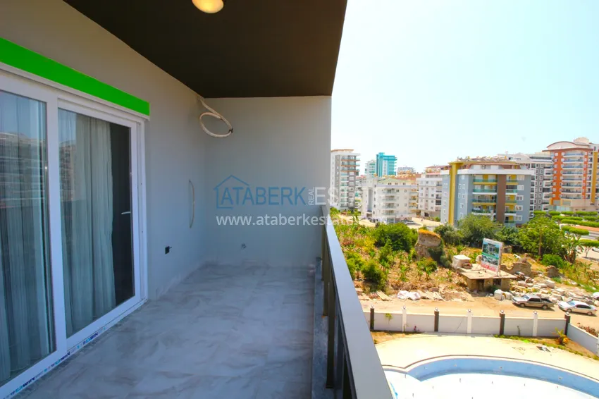 Приобрести Квартира в Махмутларе с новой мебелью в современном новом комплексе 27 