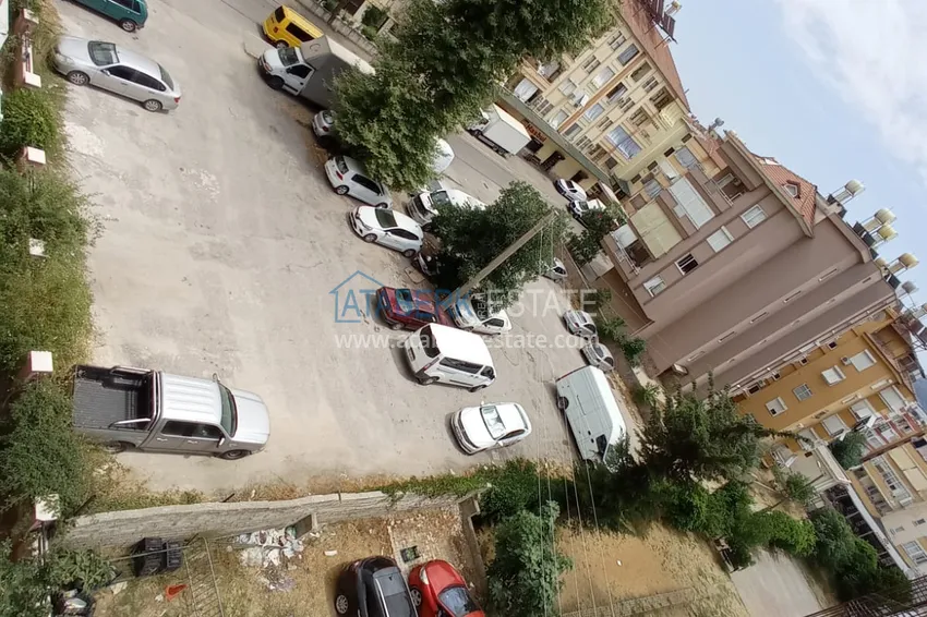 Приобрести Квартира в центре Алании четырехкомнатная с мебелью и отдельной кухней 29 