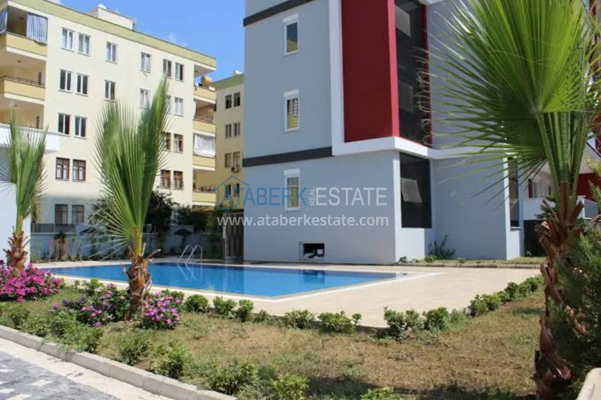 Квартира в районе Махмутлар с мебелью и отдельной кухней 2 