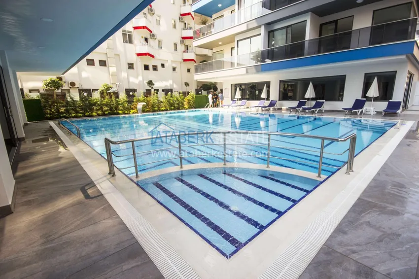 Дуплекс в Махмутларе с боковым видом на море на первой береговой линии 2 