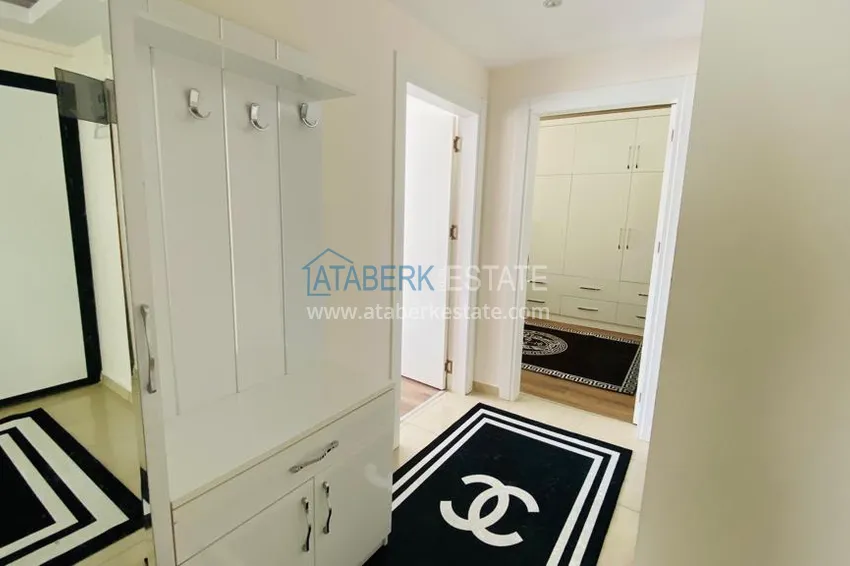 Приобрести Квартира в Махмутларе меблированная с отдельной кухней и видом на горы располагает собственной охраняемой территорией с инфраструктурой 2 