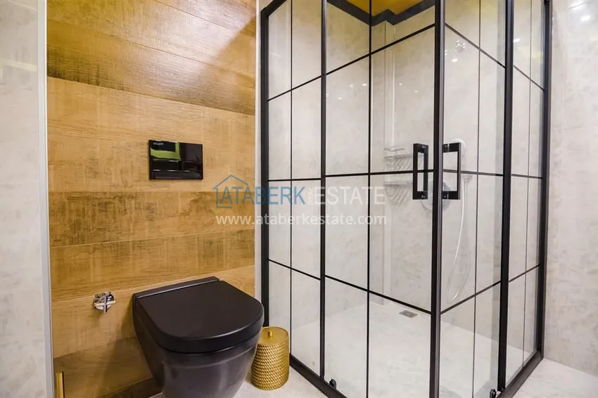 Приобрести Стильная квартира в историческом центре Алании, с дизайнерским интерьером и видом на порт 39 