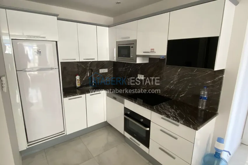 Приобрести Квартира в Махмутларе с мебелью, в жилом комплексе премиум класса 3 