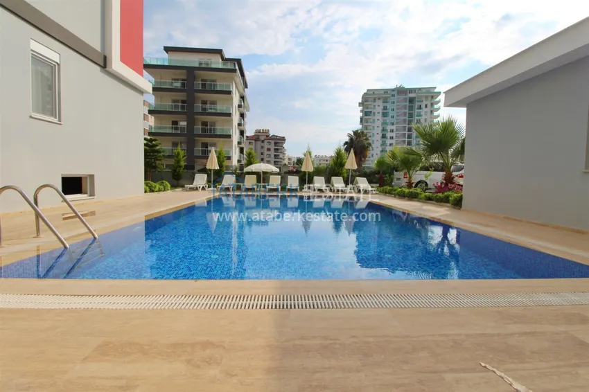 Квартира в районе Махмутлар с мебелью и отдельной кухней 3 