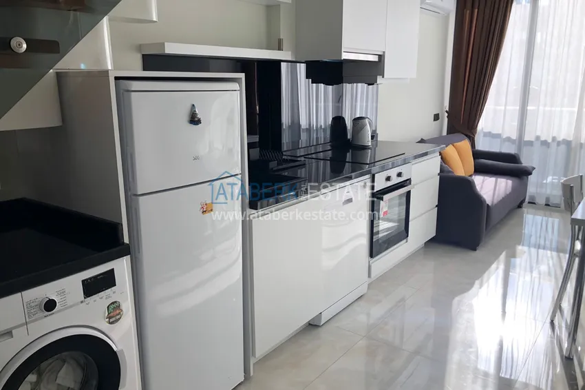 Приобрести Дуплекс в Махмутларе с боковым видом на море на первой береговой линии 3 