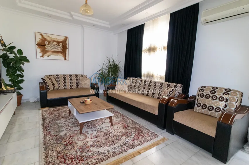 Приобрести Квартира с мебелью и частичным видом на море в Махмутларе 3 