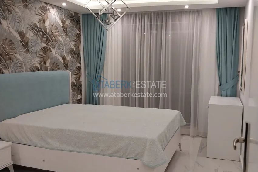 Приобрести Квартира в Махмутларе меблированная с видом на море и горы c великолепным месторасположением - в 50 метрах от центральной улицы района 4 