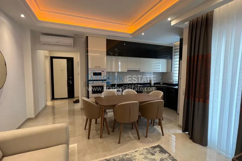 Приобрести Квартира в Махмутларе с новой мебелью и видом на горы в комплексе с отельной инфраструктурой 3 