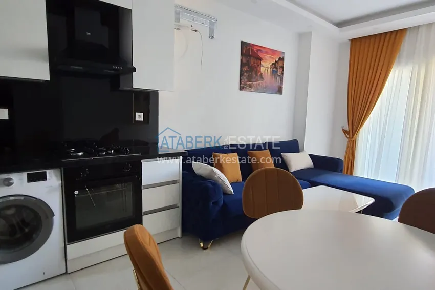 Приобрести Квартира в Махмутларе с мебелью и видом на море в резиденции отельного типа 3