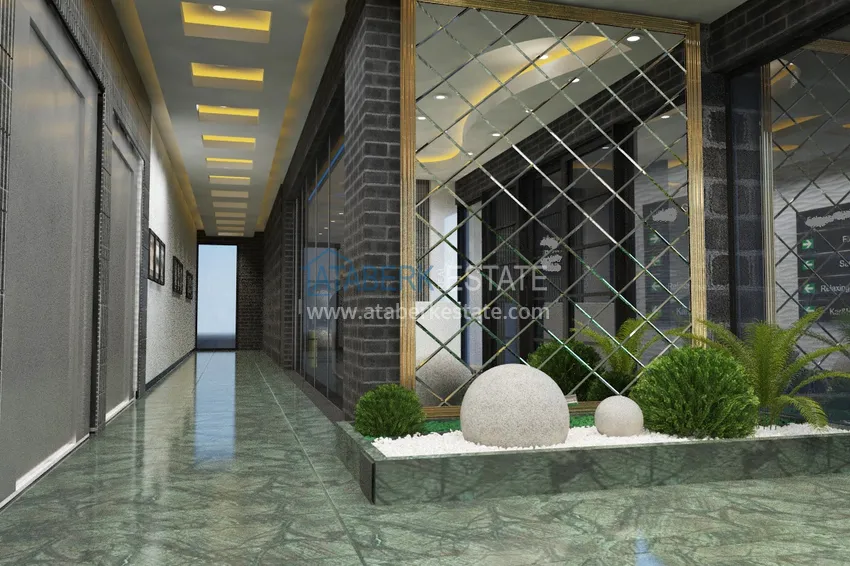 Квартира в районе Оба в жилом комплексе на этапе строительства 21 