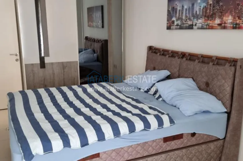 Приобрести Квартира в Махмутларе в благоустроенном жилом комплексе полностью готовая для проживанияи с мебелью с видом на море и горы 4 