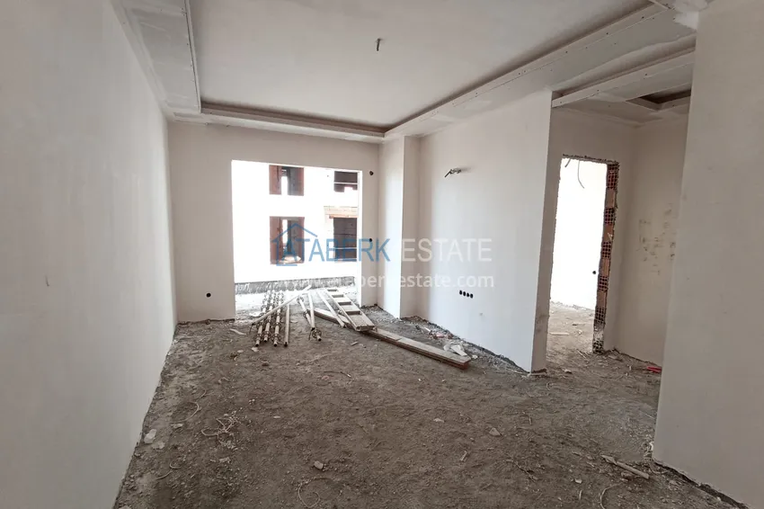 Приобрести Квартира в Махмутларе от инвестора в строящемся бутик-комплексе 4 