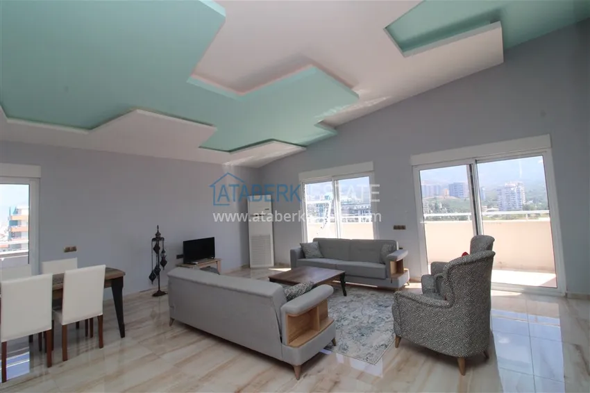 Приобрести Пентхаус в Махмутларе с мебелью, сауной и видом на море и горы 4