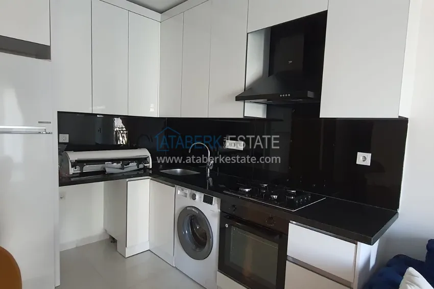 Приобрести Квартира в Махмутларе с мебелью и видом на море в резиденции отельного типа 4