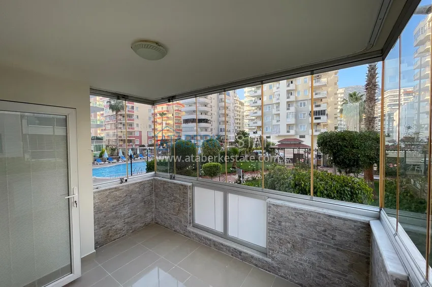 Приобрести Квартира в Махмутлар с двумя спальнями и застекленными балконами в комплексе на первой береговой 5 