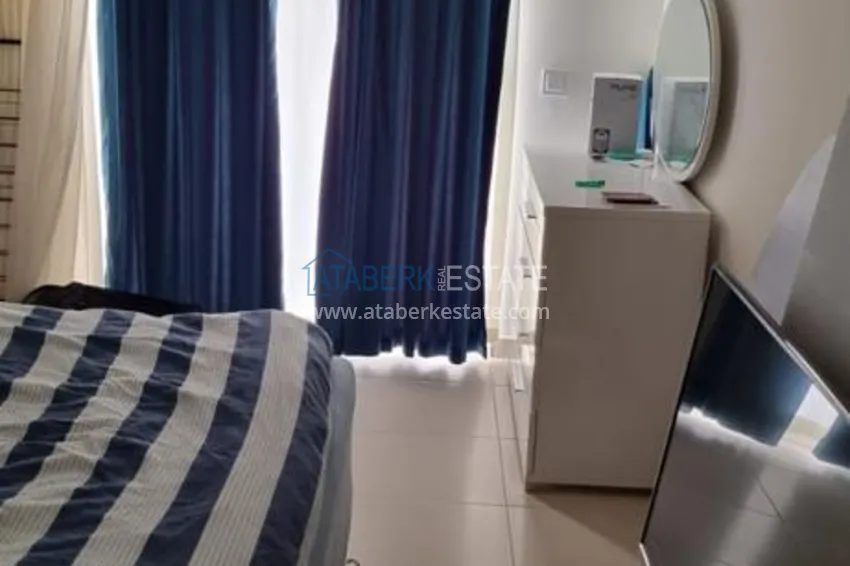 Приобрести Квартира в Махмутларе в благоустроенном жилом комплексе полностью готовая для проживанияи с мебелью с видом на море и горы 5 