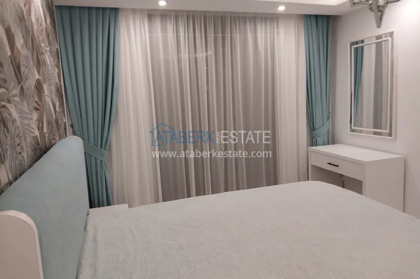 Приобрести Квартира в Махмутларе меблированная с видом на море и горы c великолепным месторасположением - в 50 метрах от центральной улицы района 6 