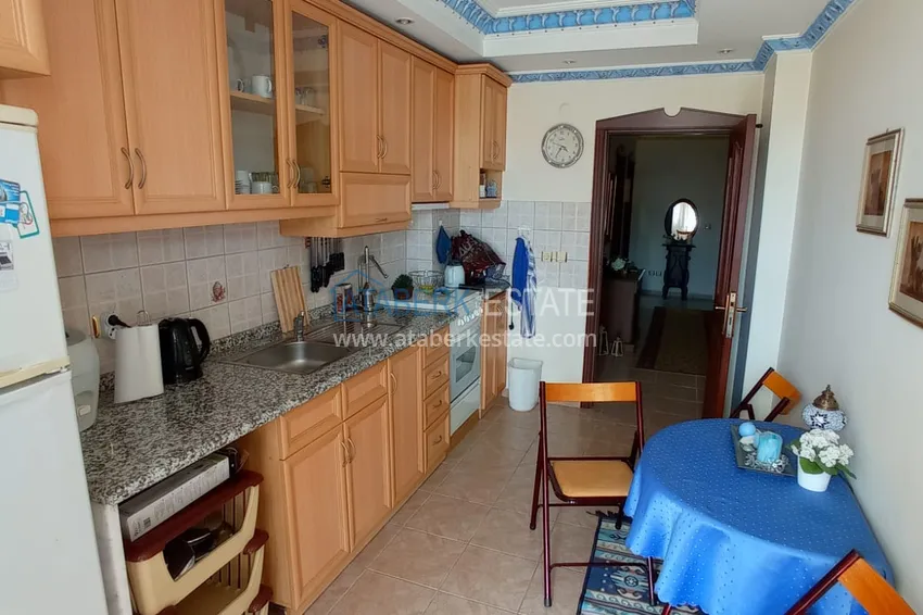 Приобрести Квартира в центре Алании четырехкомнатная с мебелью и отдельной кухней 8 