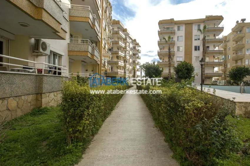 Квартира в Махмутлар с двумя спальнями и застекленными балконами в комплексе на первой береговой 5 