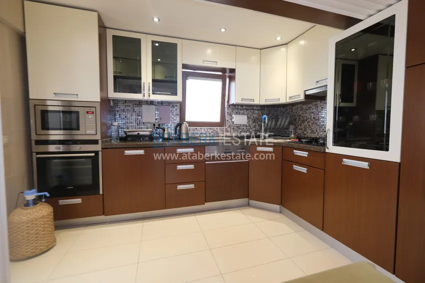 Приобрести Квартира в Махмутларе трехкомнатная с мебелью на 1 береговой линии 8 